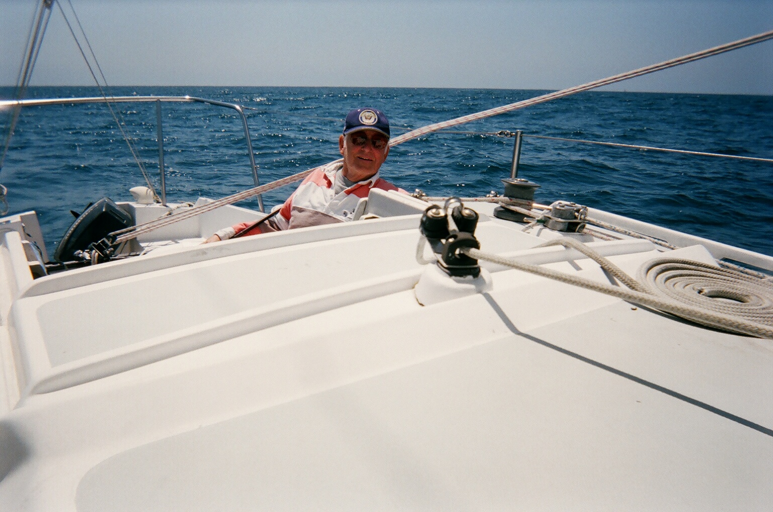 Dad sailing over the blue water