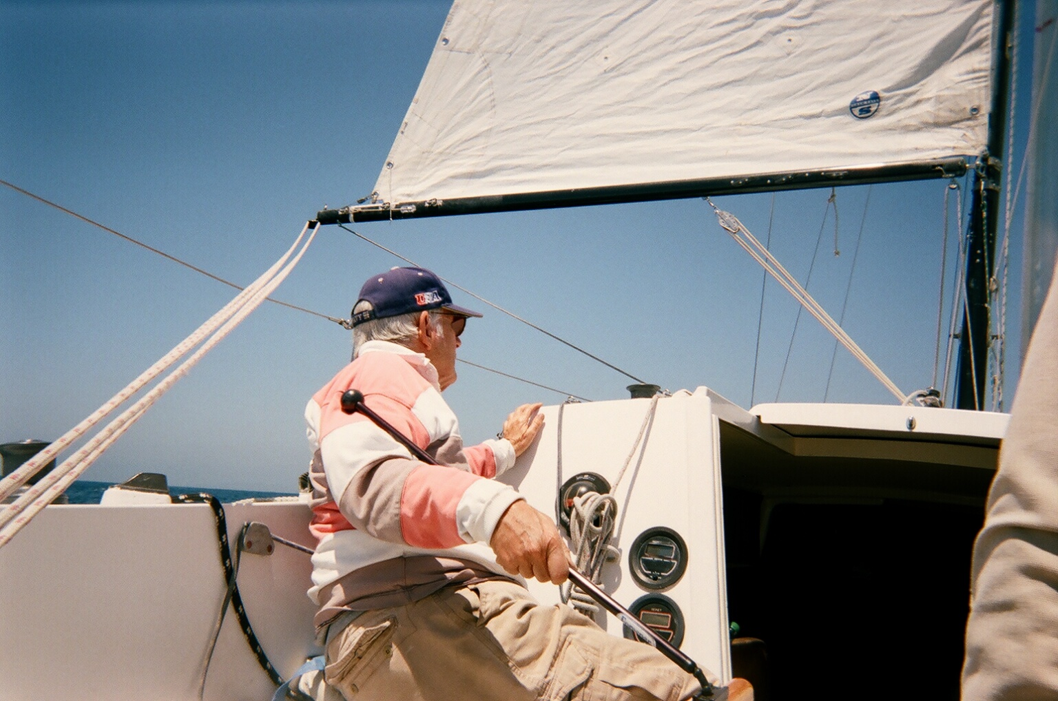 dad sailing in cockpit again